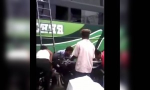 মাথায় কাউকে মোটরবাইক নিয়ে বাসে চড়তে দেখেছেন?