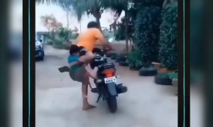 বাচ্চাকে বাইকে ওঠানোর এটা একটা নতুন টেকনিক