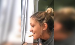 কাঠবিড়ালির সঙ্গে মেয়েটি করলো বাদাম শেয়ার